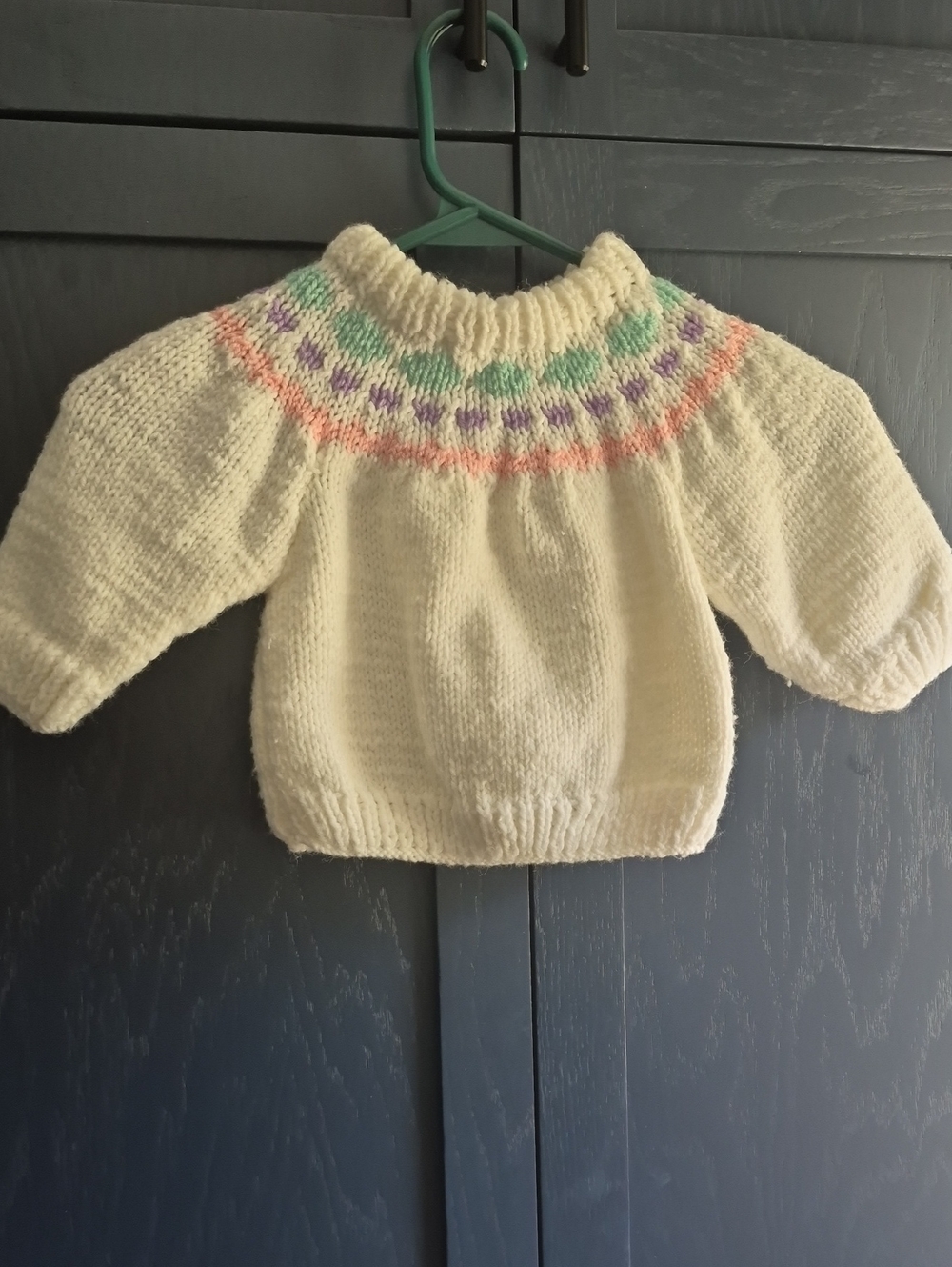 White Knit Baby Sweater with Pastel Yoke